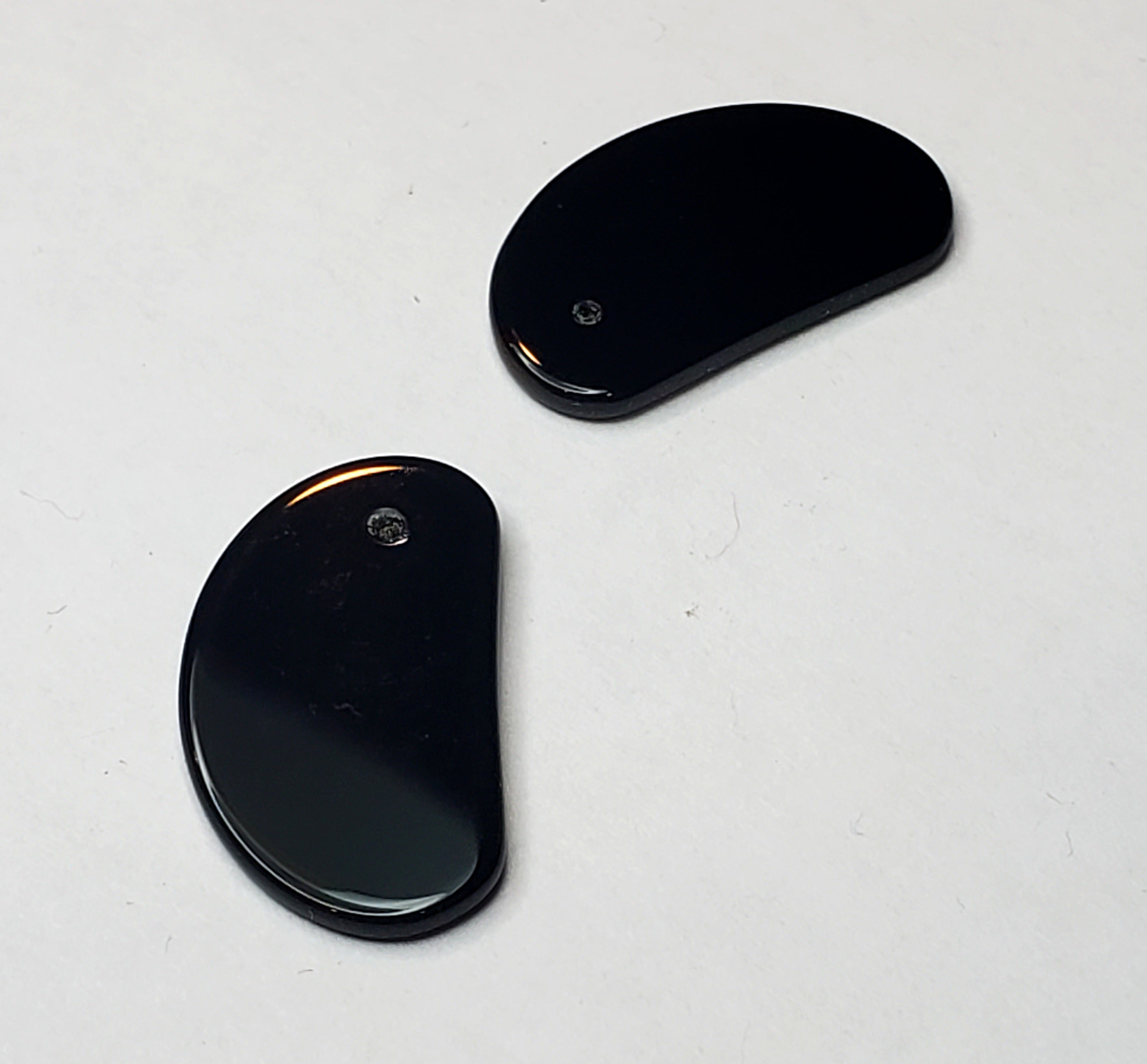 Pair of Black Onyx Demilune Tablets