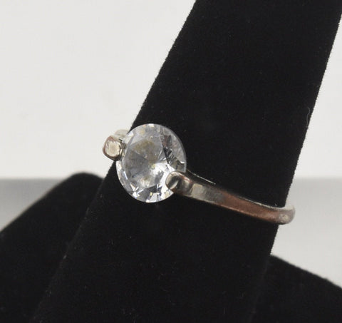 Large Colorless Round Cut Cubic Zirconia Set in Ring - Size 7.5