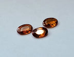 Trio of Oval Cut Orange Sapphire