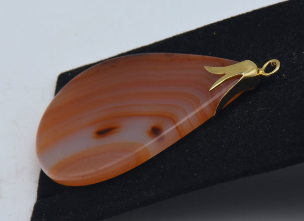 Polished Carnelian Slice Pendant