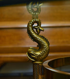 Design Institute America - Vintage Glass and Brass Dolphin Motif Coffee Table