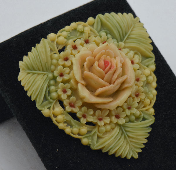 Vintage Carved Plastic Floral Arrangement Brooch