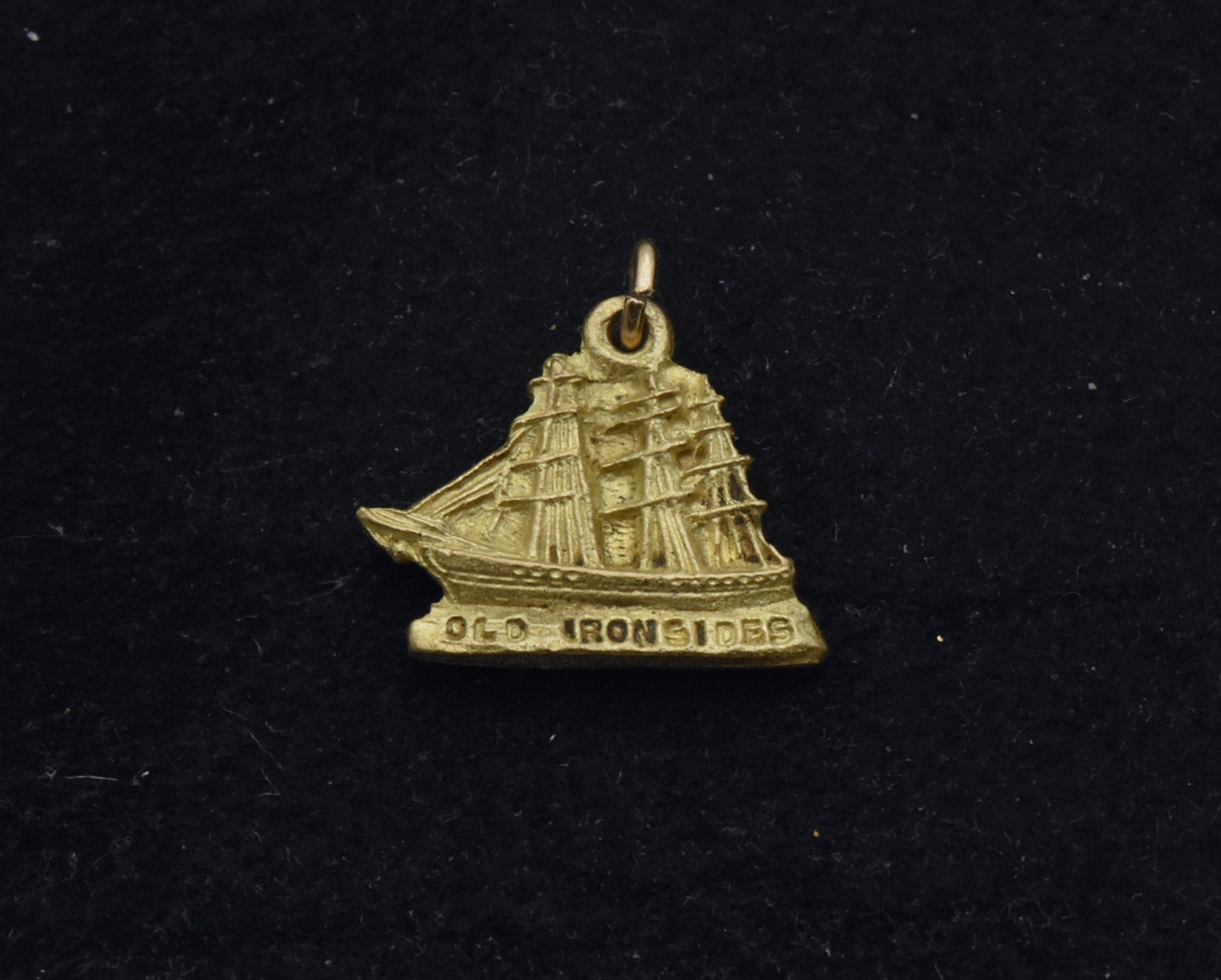 Vintage Old Irondsides Brass Charm