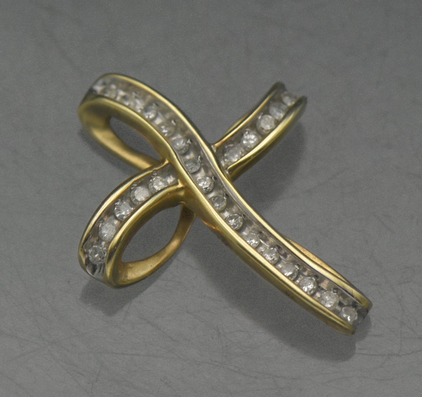 Vintage 10k and Diamonds Ribbon Cross Pendant