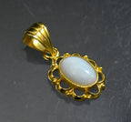 Vintage 10k Gold and White Opal Pendant