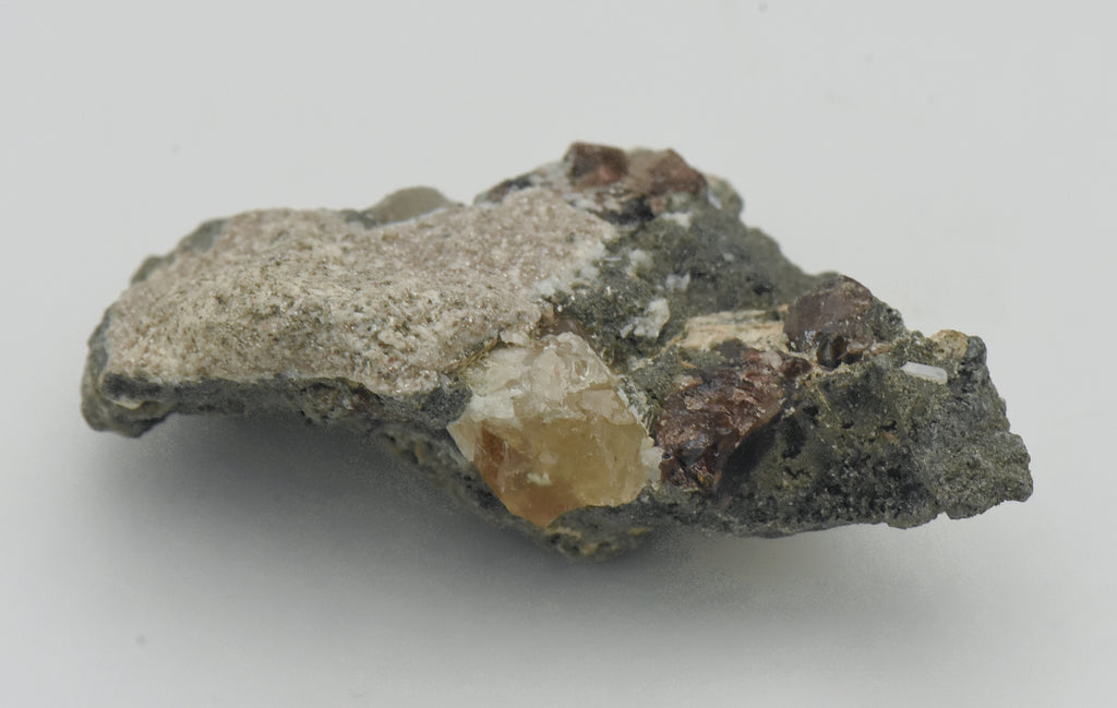 Axinite with Yellow Calcite in Matrix - Pakistan