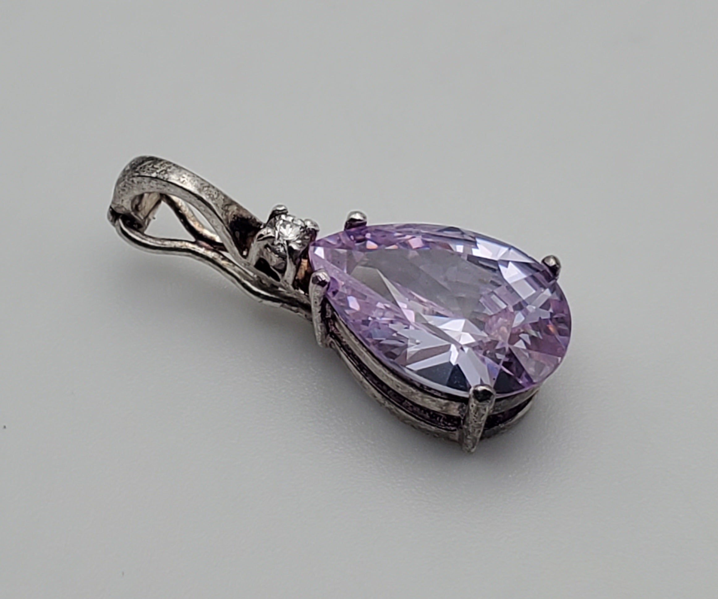 Sterling Silver Purple Cubic Zirconia Hinged Pendant