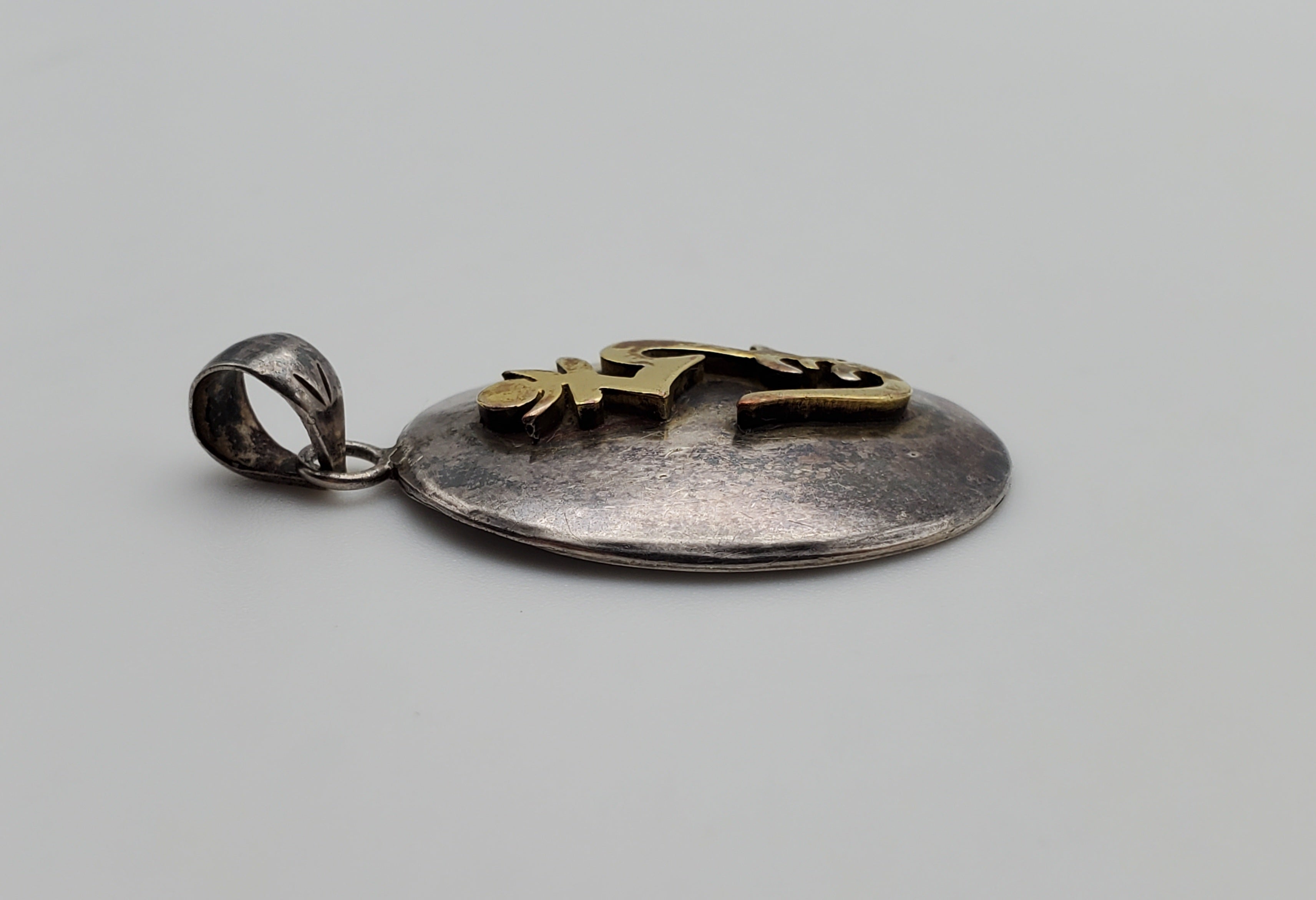 Vintage Sterling Silver and Gold Tone 'Om' Symbol Pendant