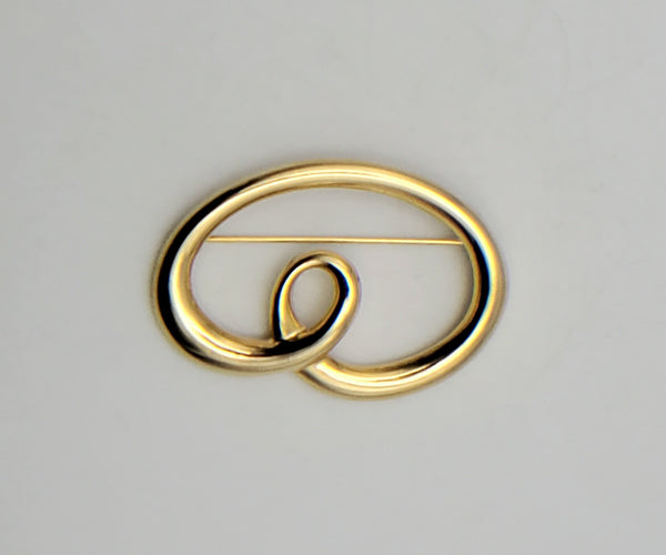 Gold Tone Metal Curly Brooch