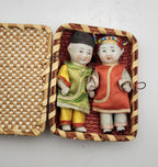 Vintage Pair of Japanese Porcelain Dolls in Wicker Basket