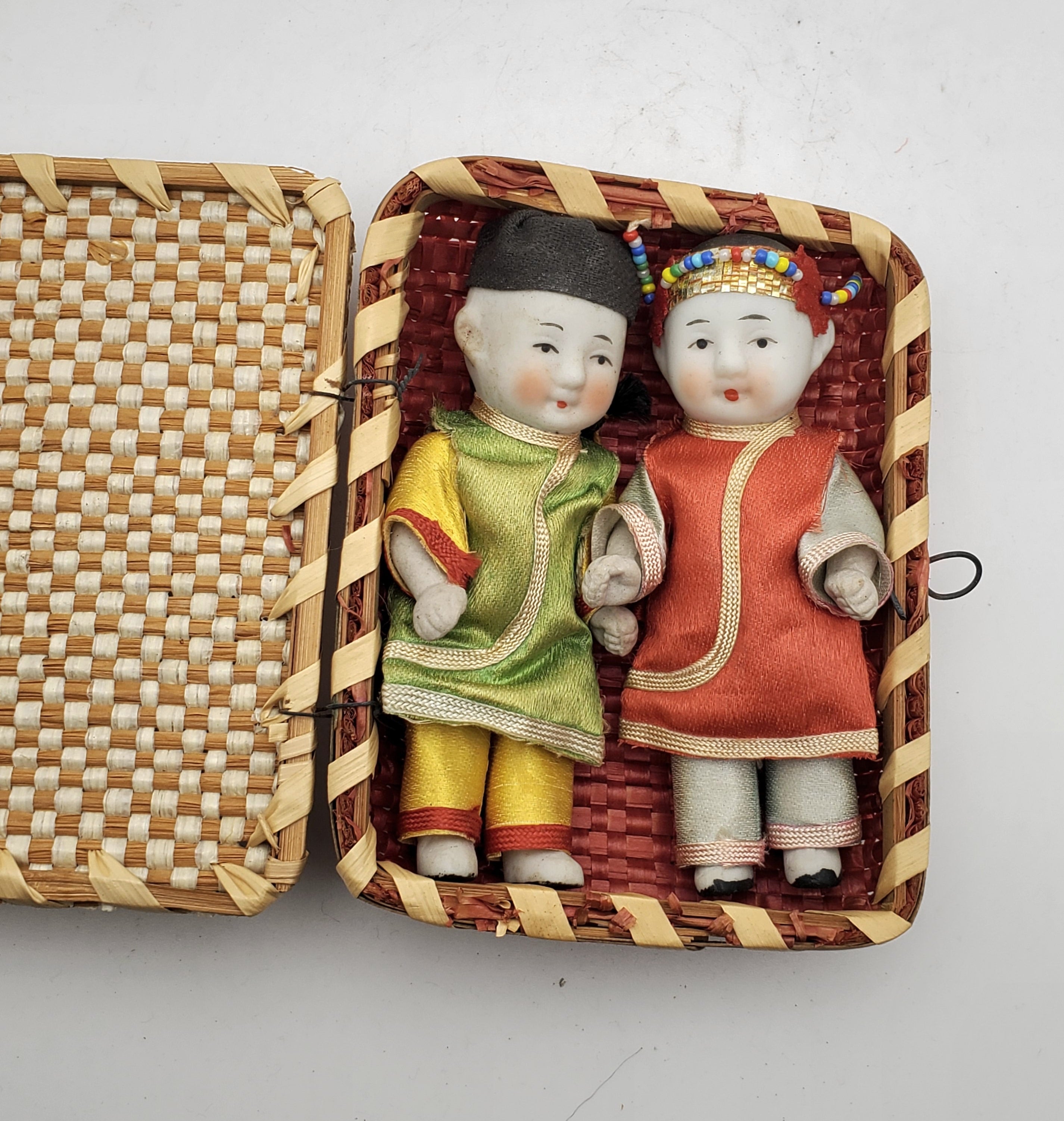 Vintage Pair of Japanese Porcelain Dolls in Wicker Basket