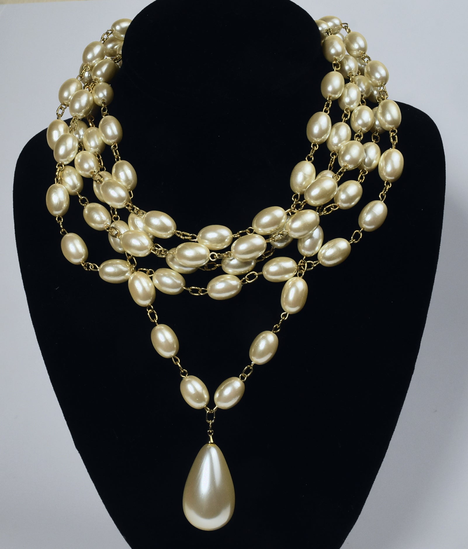 Gold Tone Four Strand Faux Pearl Necklace