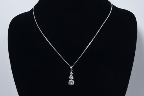 Avon - Sterling Silver Graduated Cubic Zirconia Drop Pendant on Sterling Silver Chain Necklace - 16"