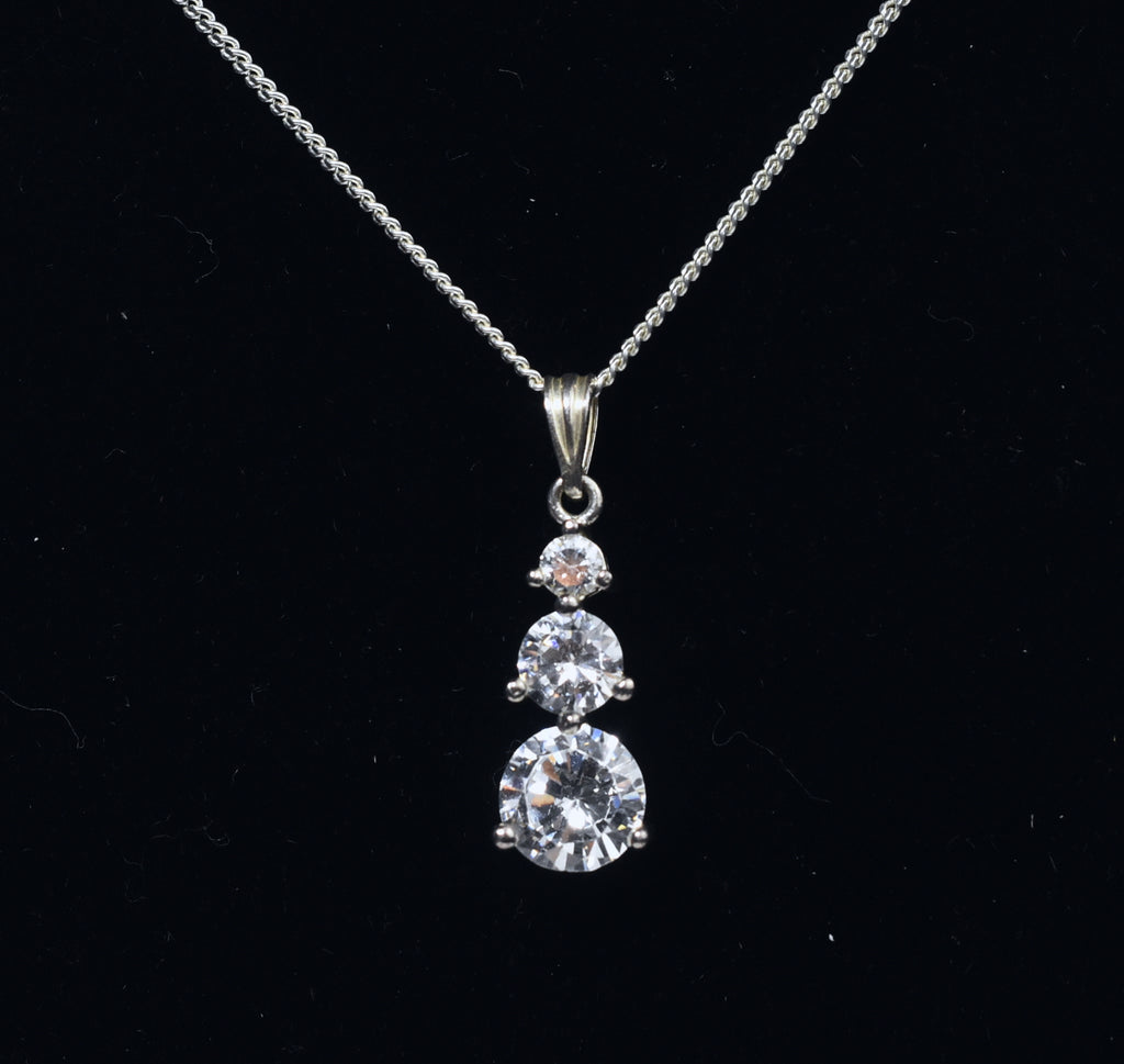 Avon - Sterling Silver Graduated Cubic Zirconia Drop Pendant on Sterling Silver Chain Necklace - 16"