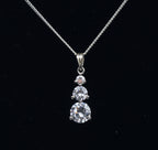 Avon - Sterling Silver Graduated Cubic Zirconia Drop Pendant on Sterling Silver Chain Necklace - 16"