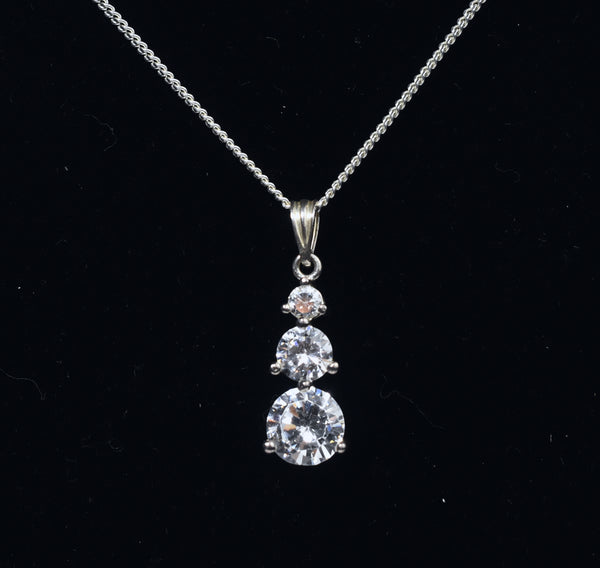 Avon - Sterling Silver Graduated Cubic Zirconia Drop Pendant on Sterling Silver Chain Necklace - 16"