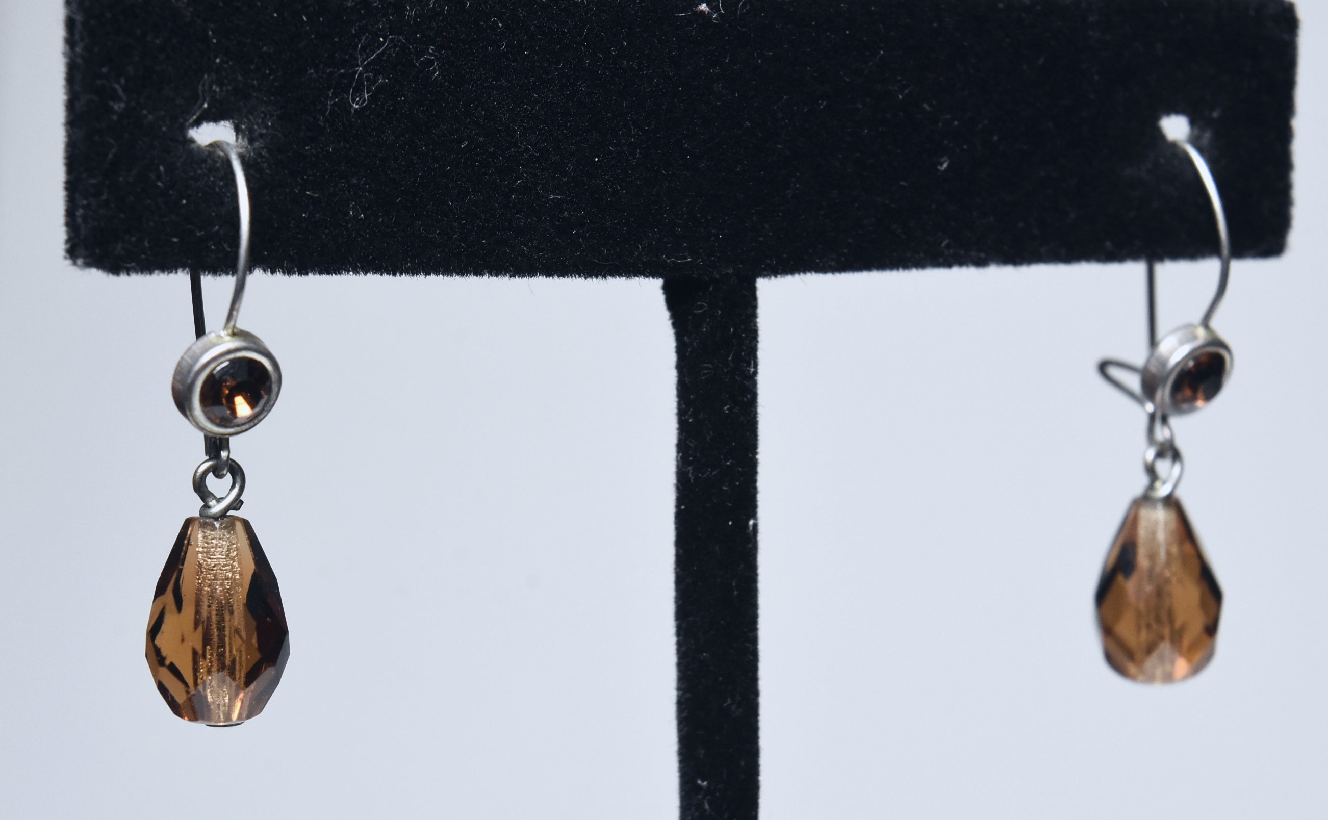 Pair of Faceted Brown Glass and Silver Tone Metal Earrings