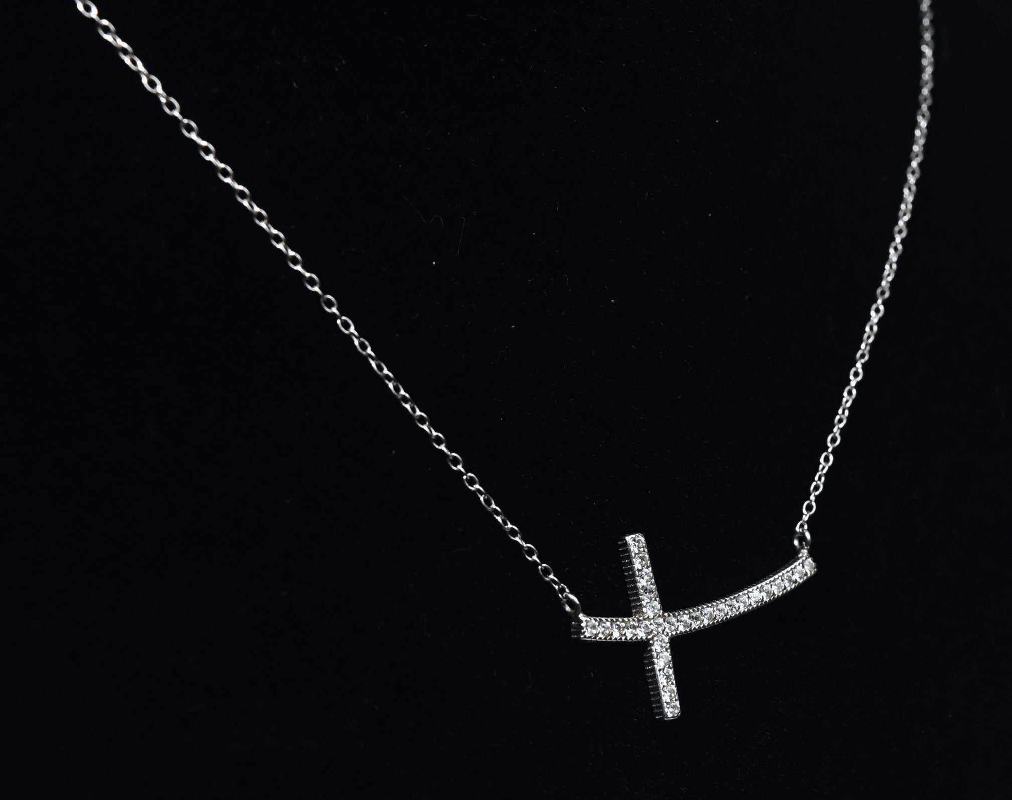 Sterling Silver Curved Crystal Cross Necklace