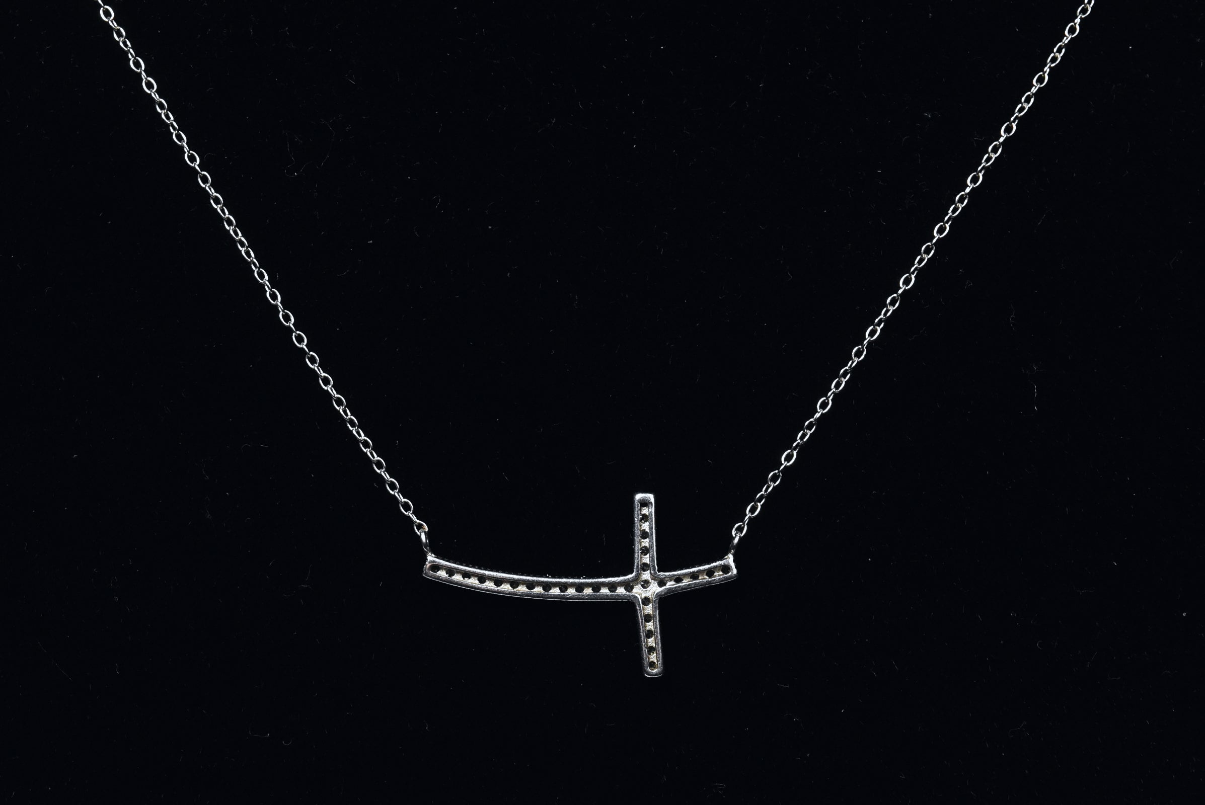 Sterling Silver Curved Crystal Cross Necklace