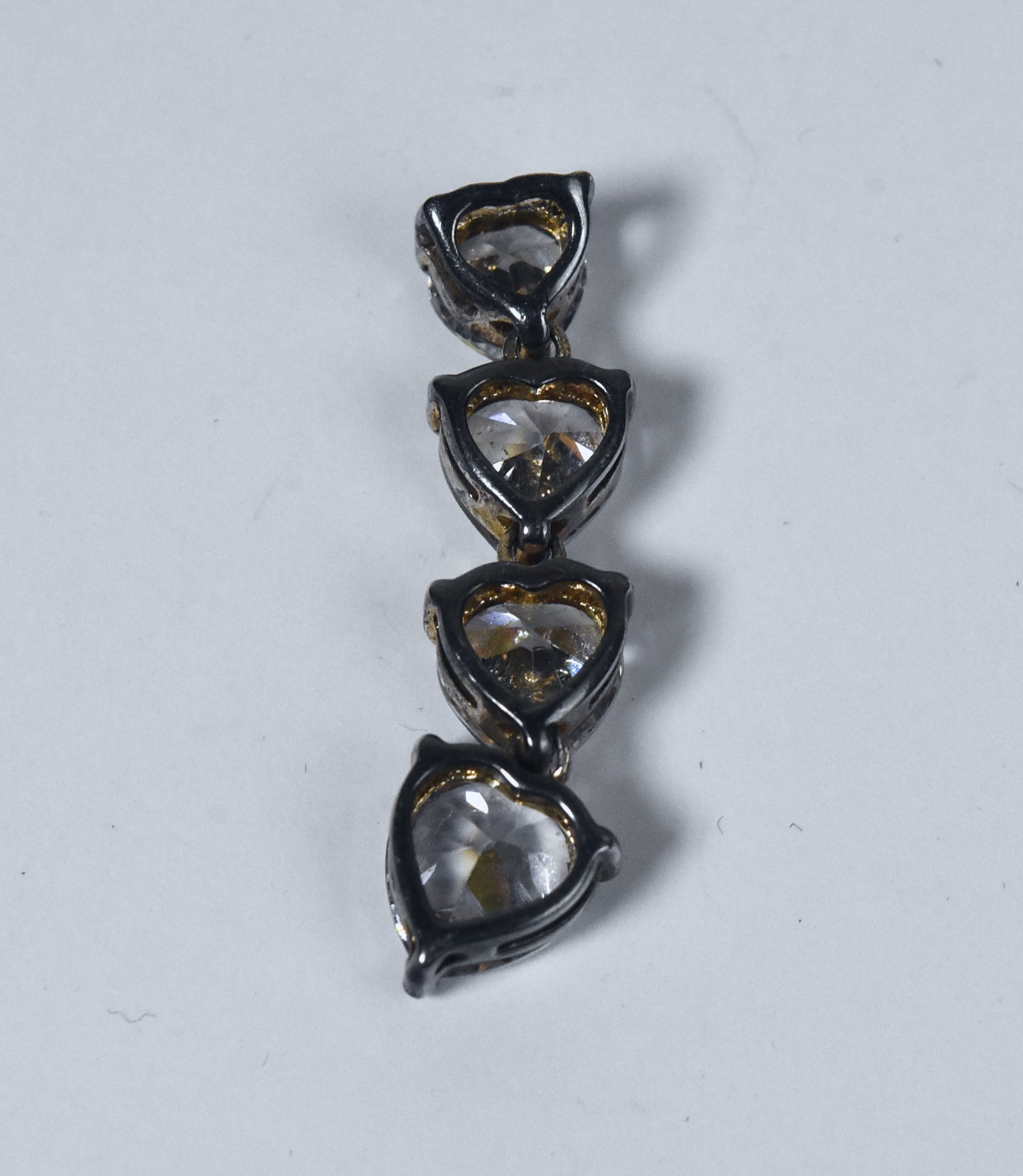 Graduated Crystal Hearts Articulated Dangle Pendant