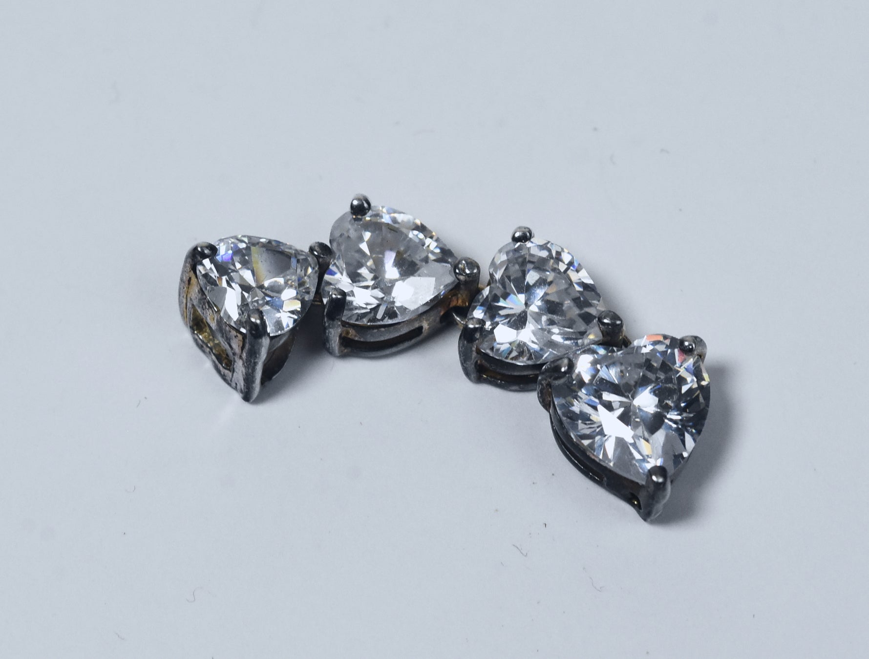Graduated Crystal Hearts Articulated Dangle Pendant