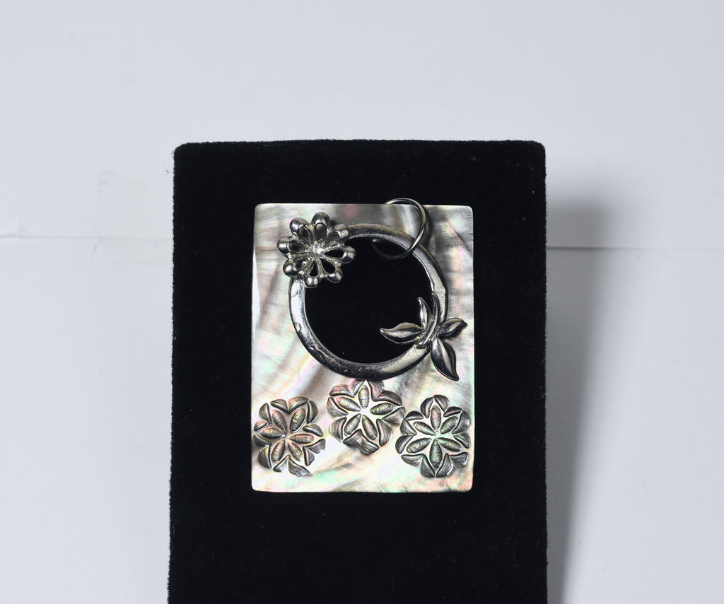 Carved Mother of Pearl Brooch with Silver Butterfly Adornment