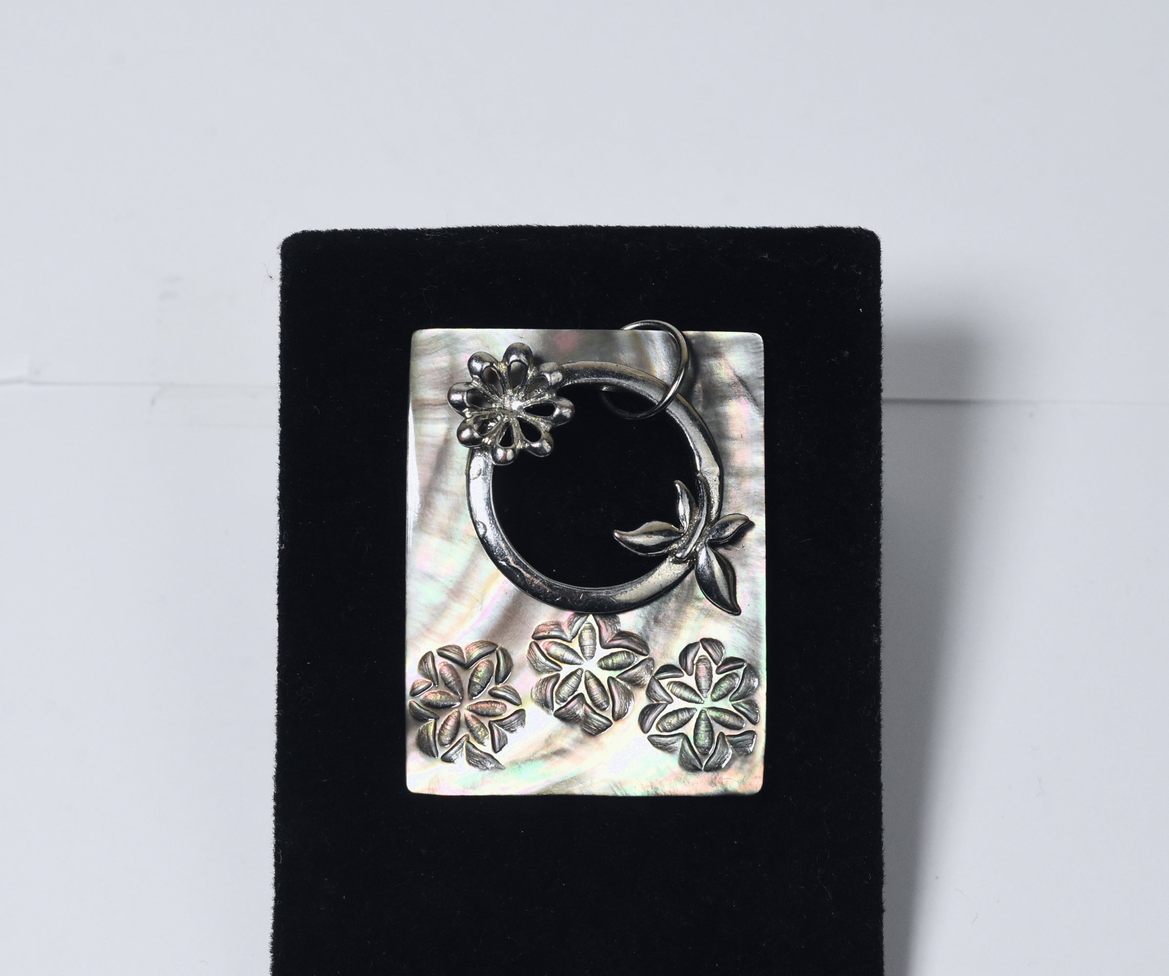 Carved Mother of Pearl Brooch with Silver Butterfly Adornment