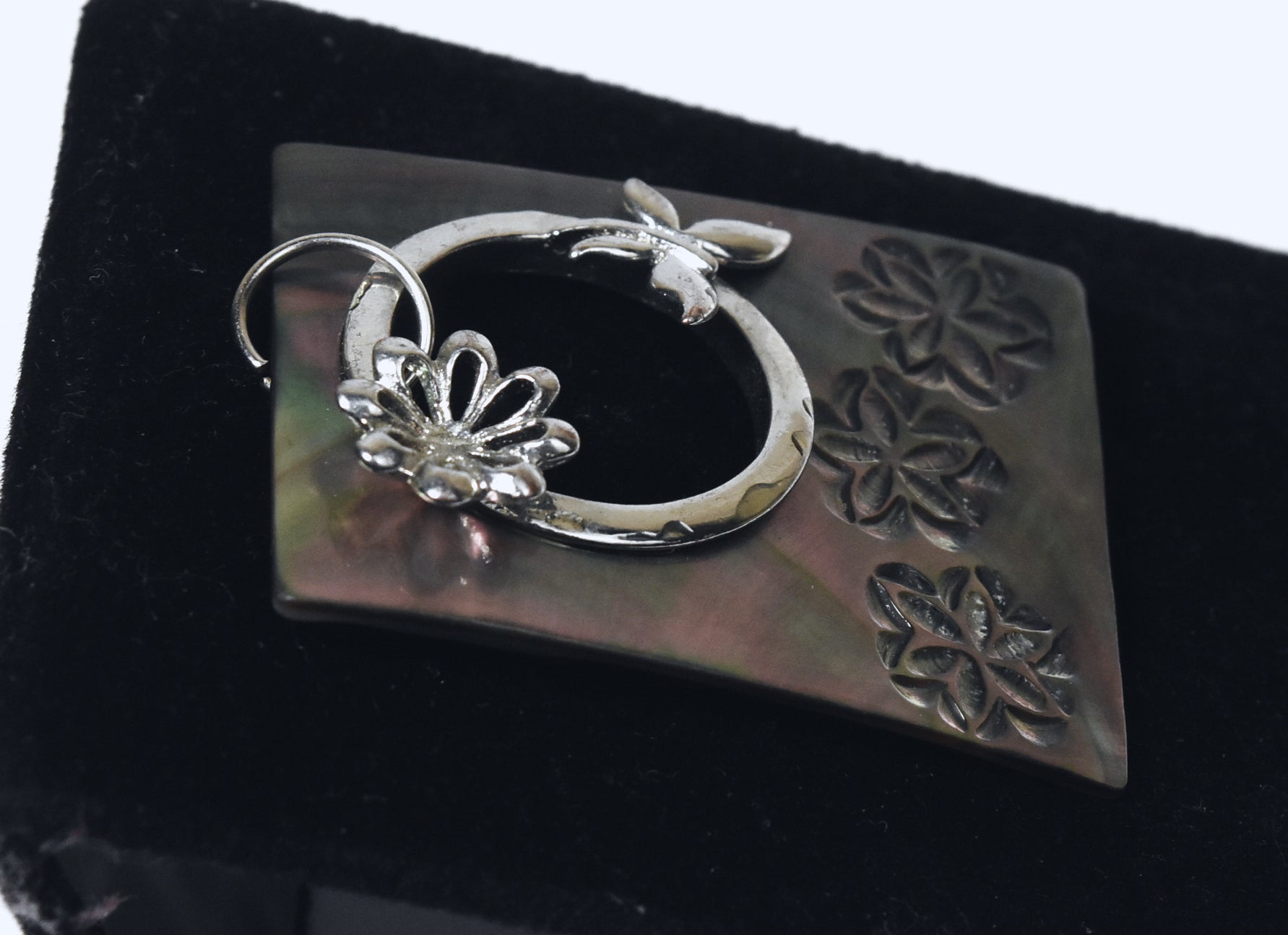 Carved Mother of Pearl Brooch with Silver Butterfly Adornment