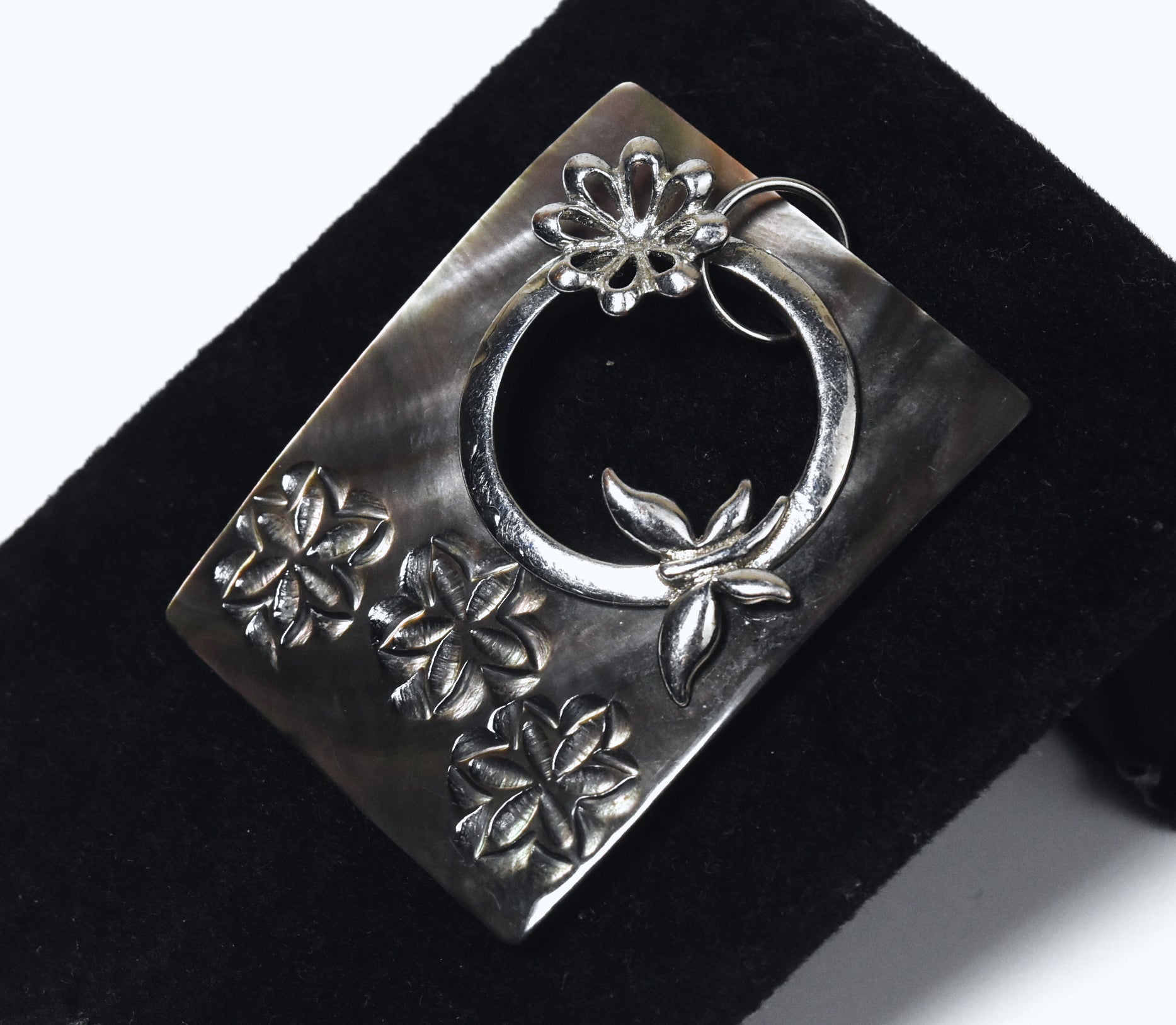 Carved Mother of Pearl Brooch with Silver Butterfly Adornment