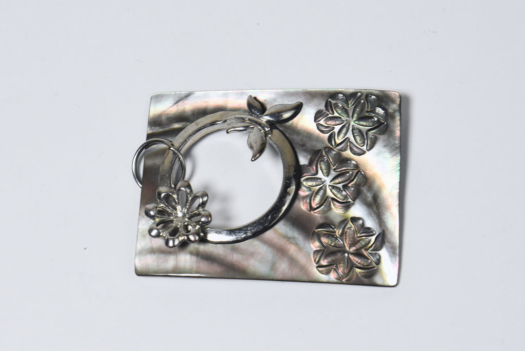 Carved Mother of Pearl Brooch with Silver Butterfly Adornment