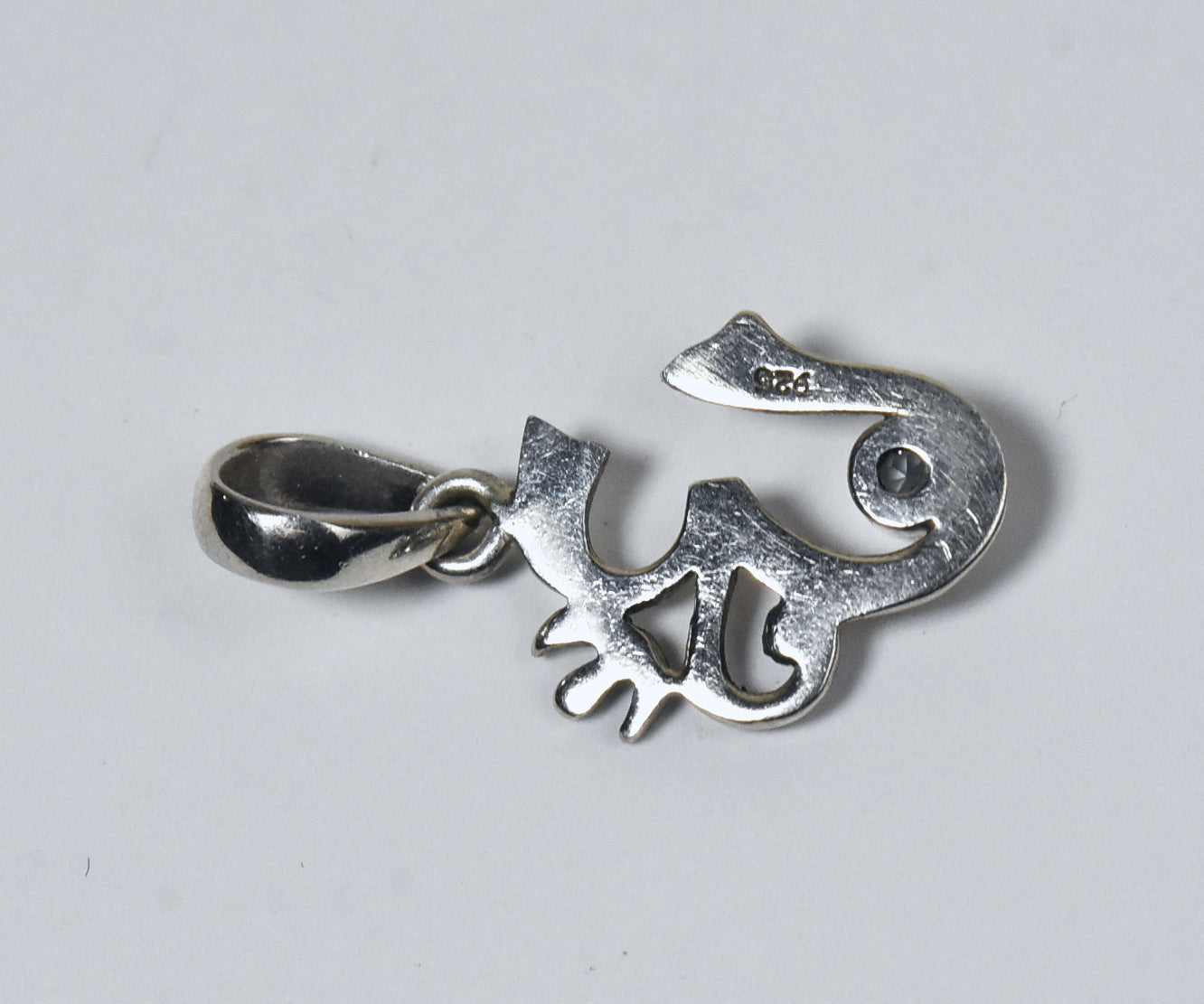 Sterling Silver Blue Topaz Om Symbol Pendant