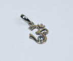 Sterling Silver Blue Topaz Om Symbol Pendant