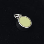 Light Green Plastic and Silver Pendant
