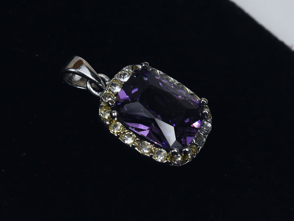 Silver Tone Pendant with Cushion Cut Purple Glass