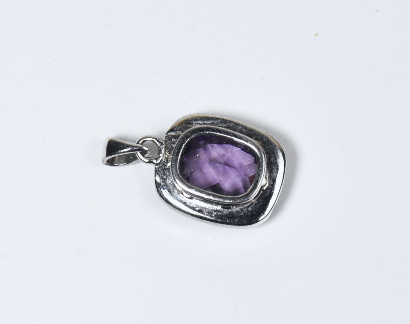 Silver Tone Pendant with Cushion Cut Purple Glass