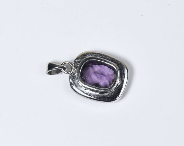 Silver Tone Pendant with Cushion Cut Purple Glass