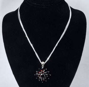 Sterling Silver Pear Cut Simulated Ruby Starburst Pendant on Three Strand Chain Necklace