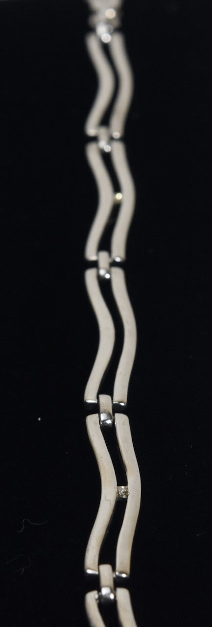 Sterling Silver Wavy Link Bracelet with Tiny Diamonds