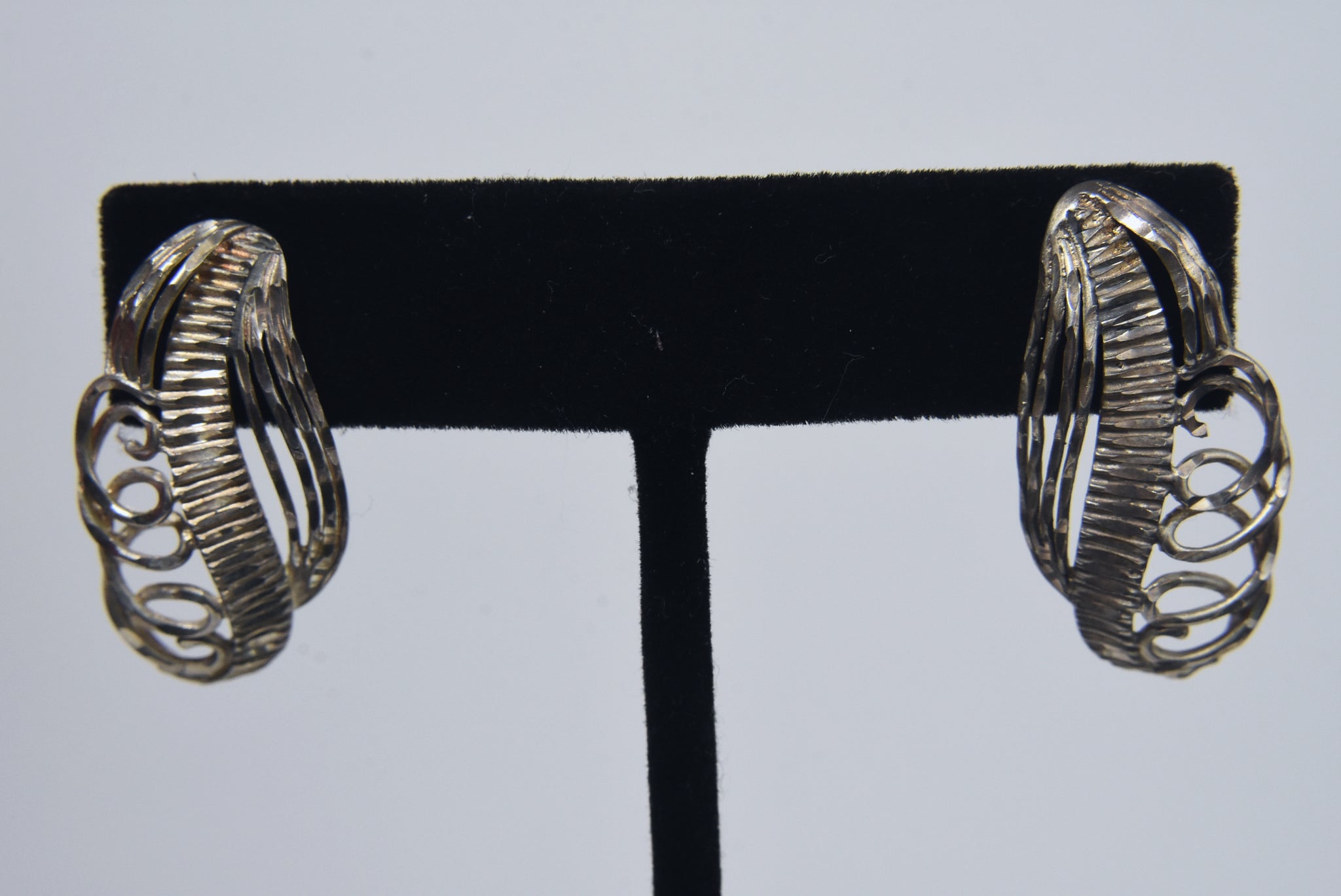 Sterling Silver Pair of Pierced Design Scroll Earrings
