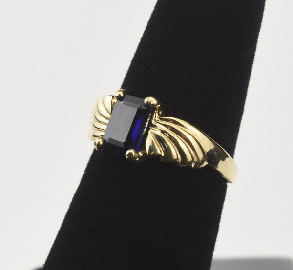 Gold Tone Sterling Silver Ring with Emerald Cut Blue Stone - Size 5.25