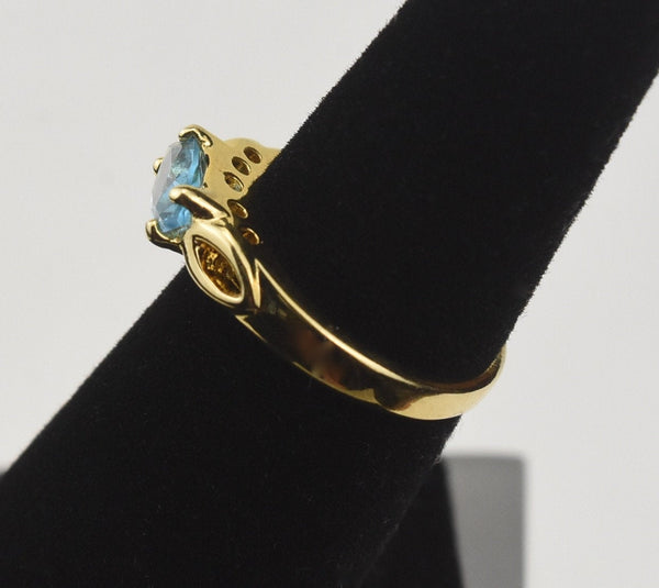 Gold Tone Sterling Silver Ring with Marquise Cut Light Blue Stone - Size 5