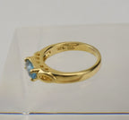 Gold Tone Sterling Silver Ring with Marquise Cut Light Blue Stone - Size 5