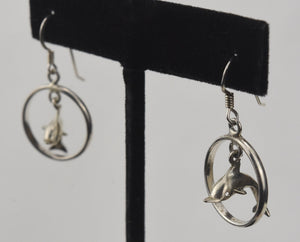 Sterling Silver Dangling Dolphins Hoop Earrings