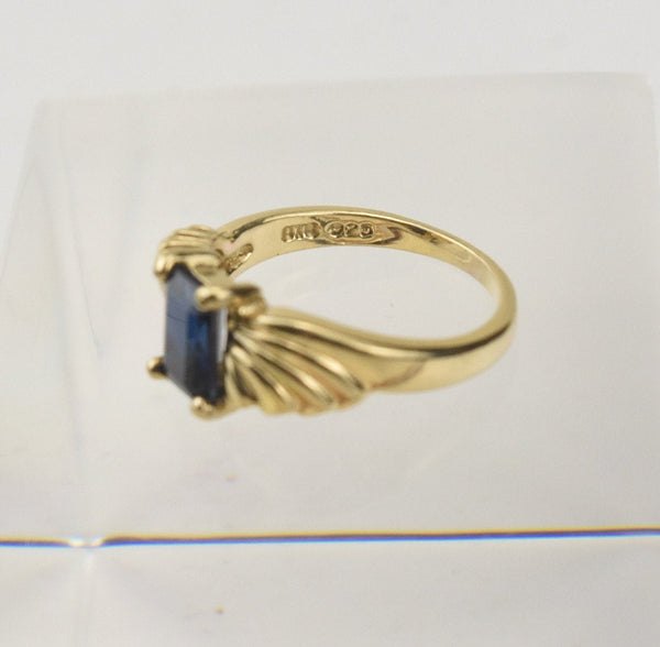 Gold Tone Sterling Silver Ring with Emerald Cut Blue Stone - Size 5.25