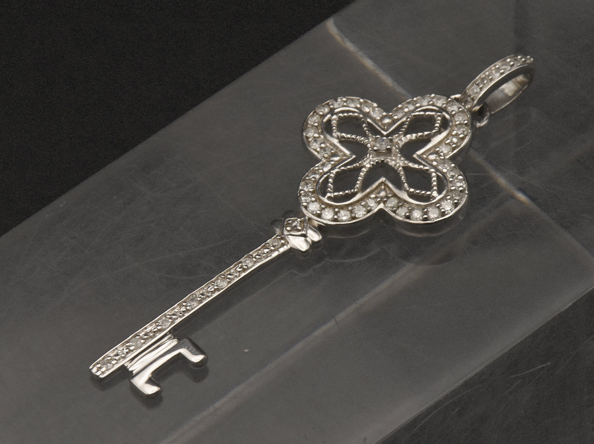 Sterling Silver and Diamonds Filigree Key Pendant