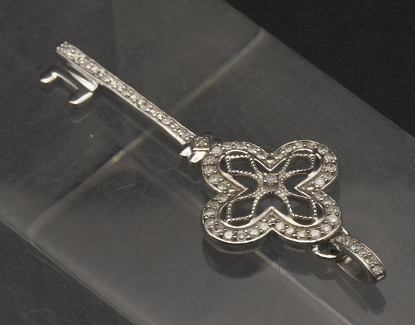 Sterling Silver and Diamonds Filigree Key Pendant